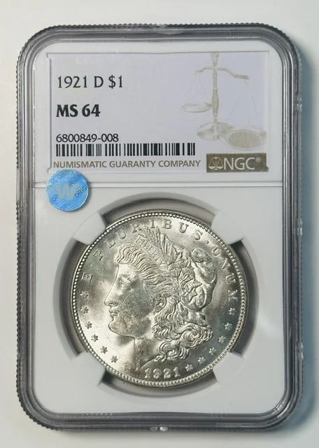 1921 Denver Morgan Dollar NGC MS64 Sight White: 1921 Denver Morgan Dollar NGC MS64 Sight White This 1921 D Morgan Silver Dollar has been graded MS-64 by NGC, indicating a high-quality, well-preserved coin. Struck at the Denver Mint, it features a c