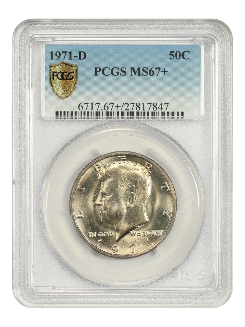 PCGS MS67+ 1971-D Kennedy Half Dollar 50C: PCGS MS67+ 1971-D Kennedy Half Dollar 50C 1971-D Kennedy Half Dollar certified by PCGS as MS67+. This uncirculated coin is offered in a pre-owned PCGS holder. Please note there is a chip on the revers