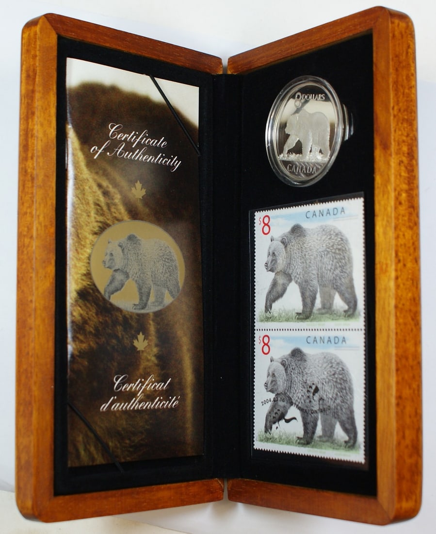 Canada 2004 Grizzly Bear $8 Silver Coin and Stamp Set with Box and COA: Canada 2004 Grizzly Bear $8 Silver Coin and Stamp Set with Box and COA This 2004 Canada "The Great Grizzly" Silver Coin and Stamp Set features an uncirculated $8 coin struck in 99.99% pure silver, wei