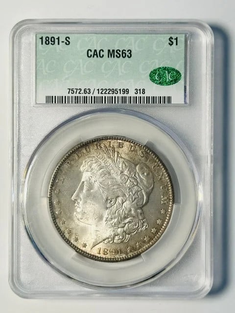 CAC MS 63 1891-S Morgan Silver Dollar $1: CAC MS 63 1891-S Morgan Silver Dollar $1 1891-S Morgan Silver Dollar graded MS 63 by CAC. This pre-owned coin is composed of silver and carries a CAC certification. Specifications Coin Type: Morgan Si
