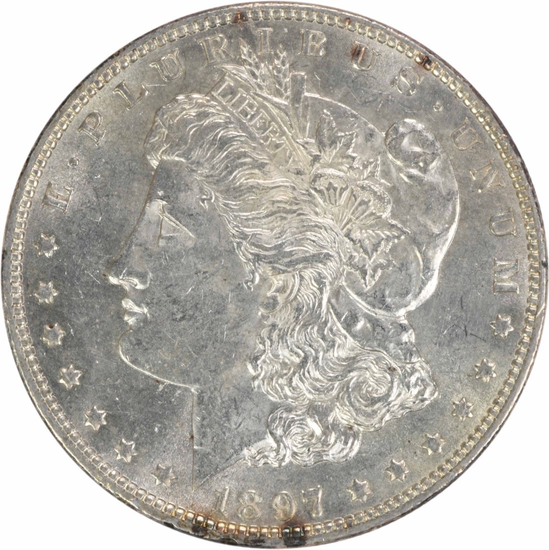 Uncirculated 1897 Morgan Dollar Silver Coin BU Grade No Mint Mark: Uncirculated 1897 Morgan Dollar Silver Coin BU Grade No Mint Mark This is an uncirculated 1897 Morgan Silver Dollar featuring a brilliant uncirculated (BU) grade. The coin is composed of silver and wa