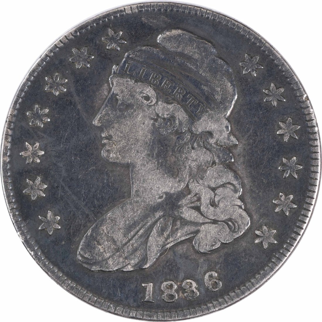 1836 Bust Half Dollar 50C VG Uncertified Philadelphia Mint: 1836 Bust Half Dollar 50C VG Uncertified Philadelphia Mint This 1836 Bust Half Dollar is a captivating piece of American numismatic history. Struck at the Philadelphia Mint, this coin features the int