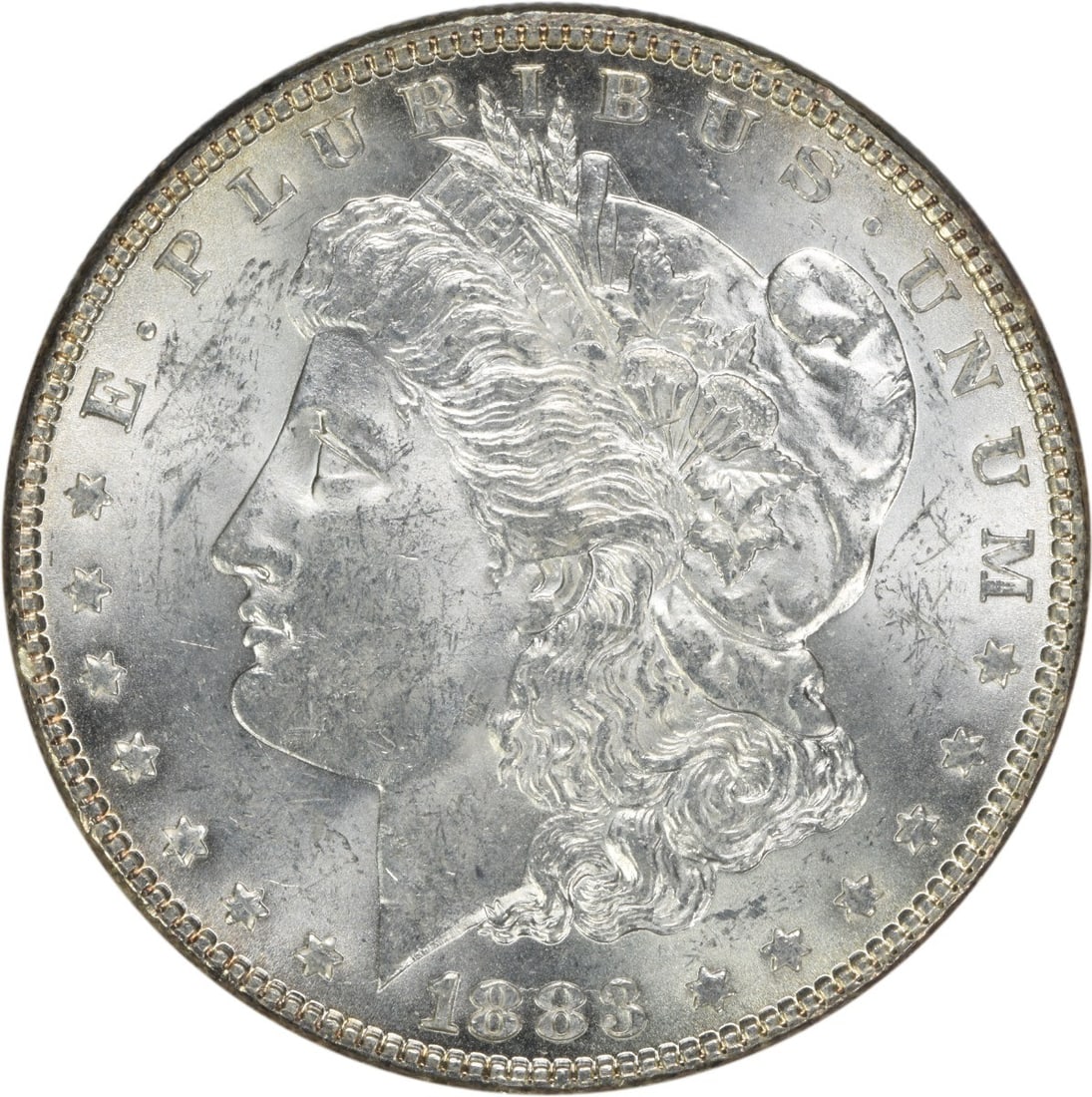 1883 Silver Morgan Dollar Brilliant Uncirculated Uncertified Coin: 1883 Silver Morgan Dollar Brilliant Uncirculated Uncertified Coin This 1883 Morgan Silver Dollar is a Brilliant Uncirculated (BU) example, featuring no mint mark and composed of silver. Originating fr