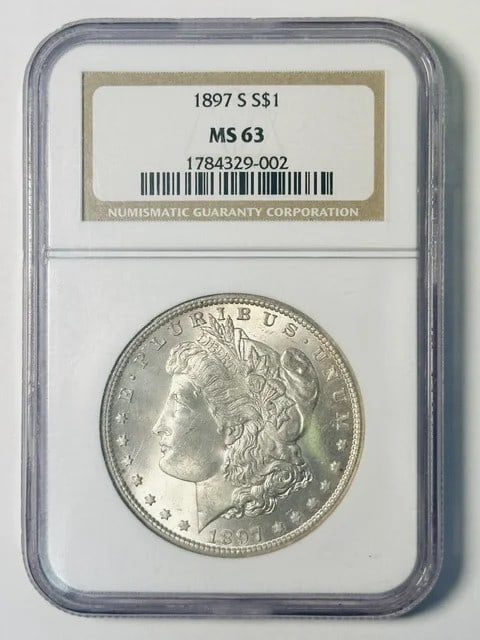 NGC MS-63 1897 S Morgan Silver Dollar Coin: NGC MS-63 1897 S Morgan Silver Dollar Coin 1897 Morgan Silver Dollar certified by NGC and graded MS 63. This pre-owned United States silver dollar was minted in San Francisco and carries denomination 