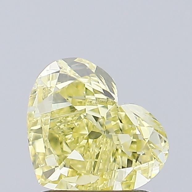 Loose Diamond - HEART 1.15ct Fancy Intense Yellow VVS2: Loose Diamond - HEART 1.15ct Fancy Intense Yellow VVS2 Source: This is a real non-mined Diamond that has been grown in a lab Shape: HEART Carats: 1.15 Color: Fancy Intense Yellow Certification: IGI Vi