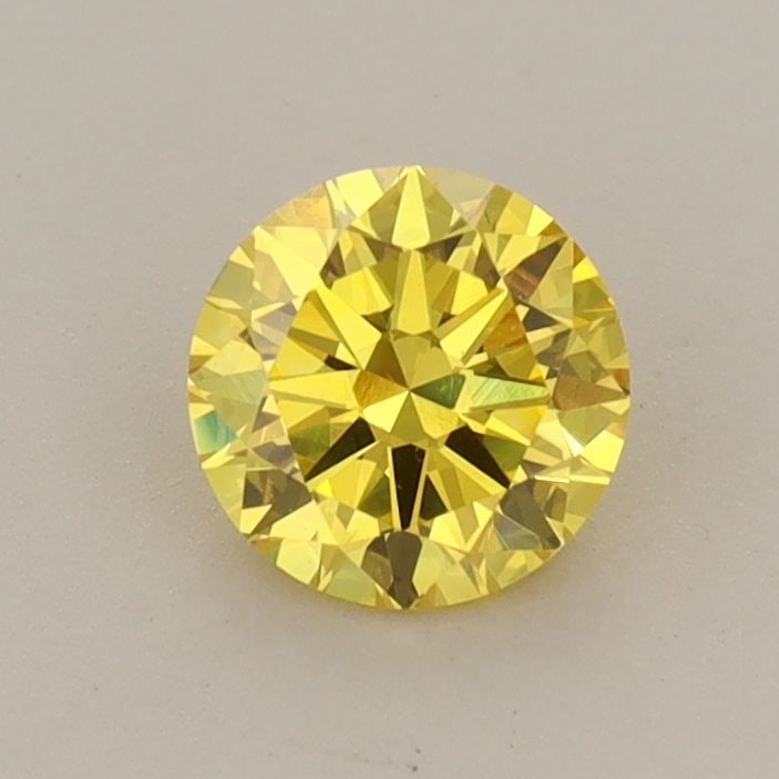 Loose Diamond - ROUND 0.61ct Fancy Vivid Yellow VS1: Loose Diamond - ROUND 0.61ct Fancy Vivid Yellow VS1 Source: This is a real non-mined Diamond that has been grown in a lab Shape: ROUND Carats: 0.61 Color: Fancy Vivid Yellow Certification: IGI Video: