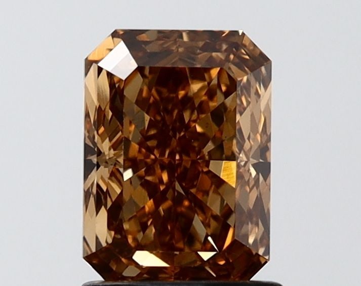 Loose Diamond - RADIANT 1.52ct Fancy Light Brown VS1: Loose Diamond - RADIANT 1.52ct Fancy Light Brown VS1 Source: This is a real non-mined Diamond that has been grown in a lab Shape: RADIANT Carats: 1.52 Color: Fancy Light Brown Certification: IGI Video