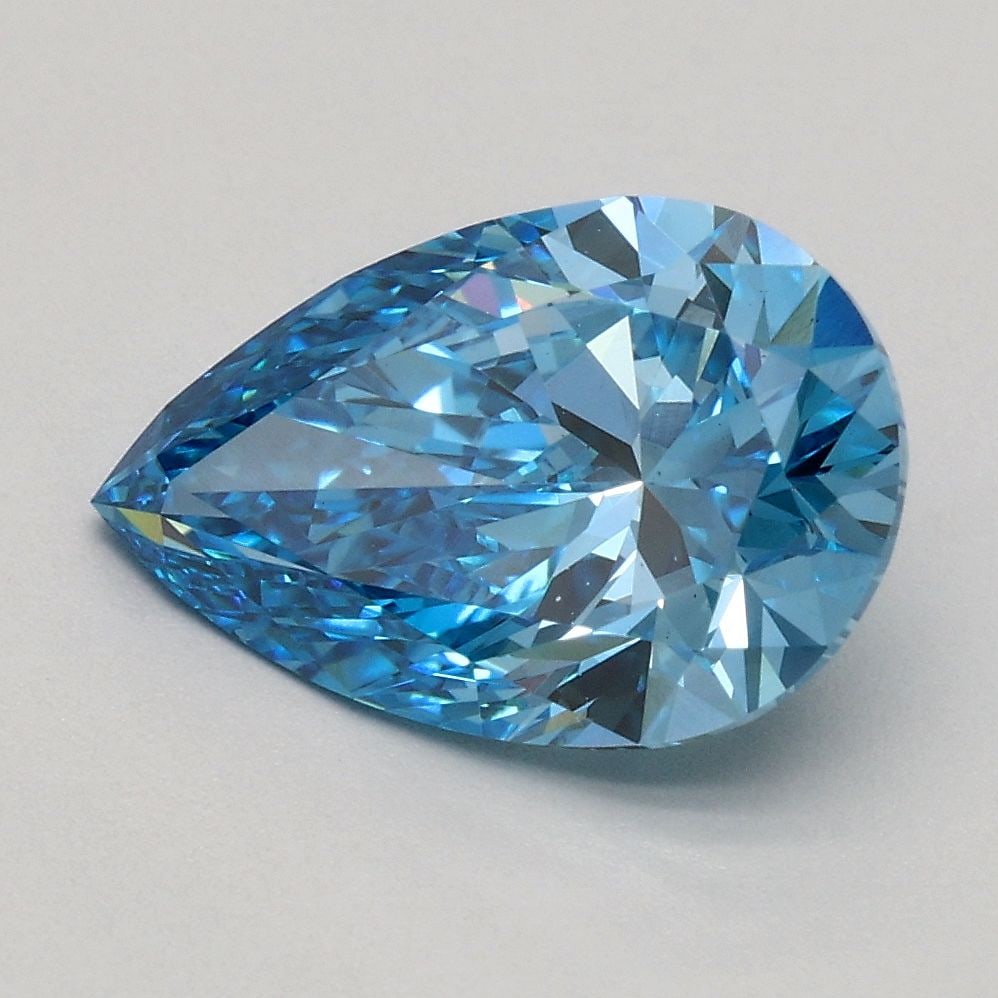 Loose Diamond - PEAR 1.8ct Fancy Vivid Blue VS1: Loose Diamond - PEAR 1.8ct Fancy Vivid Blue VS1 Source: This is a real non-mined Diamond that has been grown in a lab Shape: PEAR Carats: 1.8 Color: Fancy Vivid Blue Certification: IGI Video: