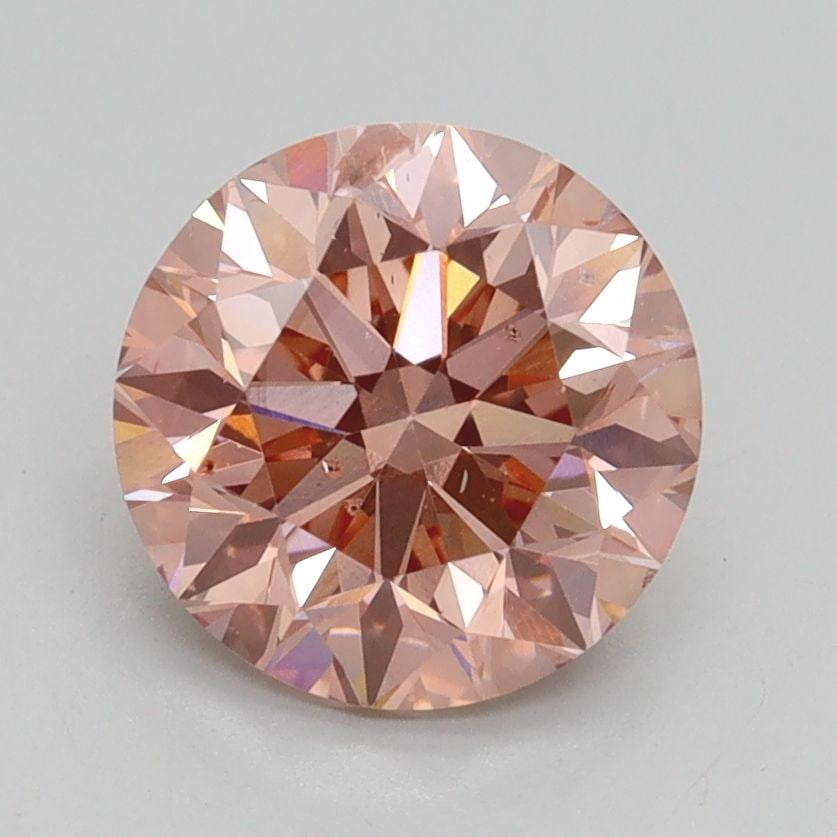 Loose Diamond - ROUND 2.0ct Fancy Intense Pink SI1: Loose Diamond - ROUND 2.0ct Fancy Intense Pink SI1 Source: This is a real non-mined Diamond that has been grown in a lab Shape: ROUND Carats: 2.0 Color: Fancy Intense Pink Certification: IGI Video: