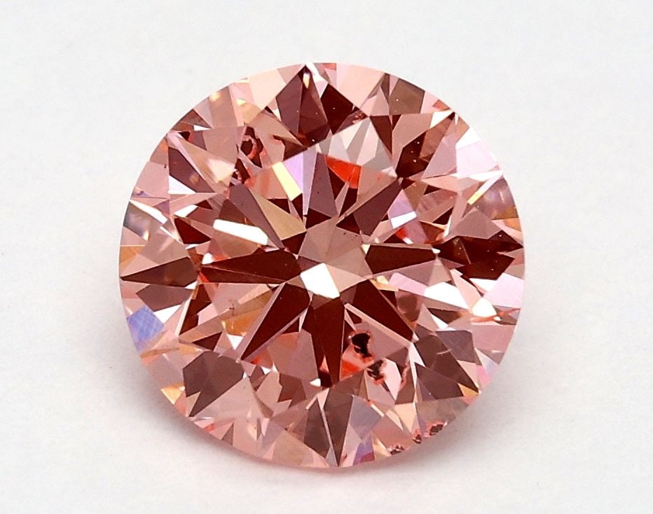 Ideal Loose Diamond - ROUND 1.32ct Fancy Vivid Pink SI2: Ideal Loose Diamond - ROUND 1.32ct Fancy Vivid Pink SI2 Source: This is a real non-mined Diamond that has been grown in a lab Shape: ROUND Carats: 1.32 Color: Fancy Vivid Pink Certification: IGI Video