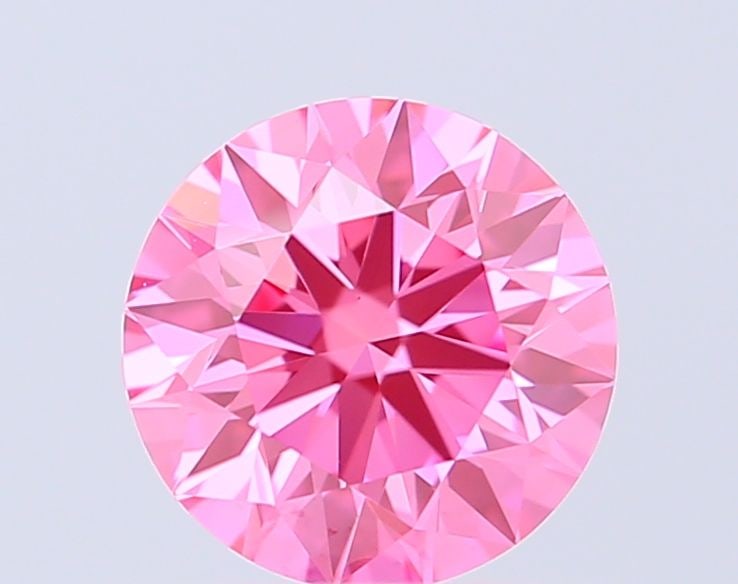 Ideal Loose Diamond - ROUND 0.73ct Fancy Vivid Pink VVS2: Ideal Loose Diamond - ROUND 0.73ct Fancy Vivid Pink VVS2 Source: This is a real non-mined Diamond that has been grown in a lab Shape: ROUND Carats: 0.73 Color: Fancy Vivid Pink Certification: IGI Vide
