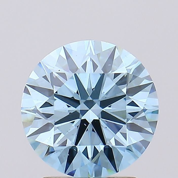 Ideal Loose Diamond - ROUND 2.05ct Fancy Vivid Blue VS2: Ideal Loose Diamond - ROUND 2.05ct Fancy Vivid Blue VS2 Source: This is a real non-mined Diamond that has been grown in a lab Shape: ROUND Carats: 2.05 Color: Fancy Vivid Blue Certification: IGI Video