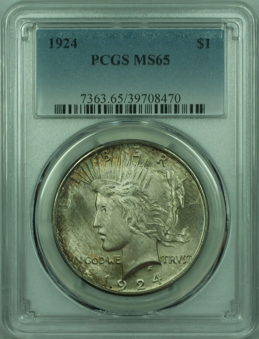 PCGS MS-65 1924 Peace Dollar Silver $1 Toned: PCGS MS-65 1924 Peace Dollar Silver $1 Toned 1924 Peace Silver Dollar $1 coin certified by PCGS and graded MS-65. This uncirculated silver coin features attractive toning and is offered in pre-owned c