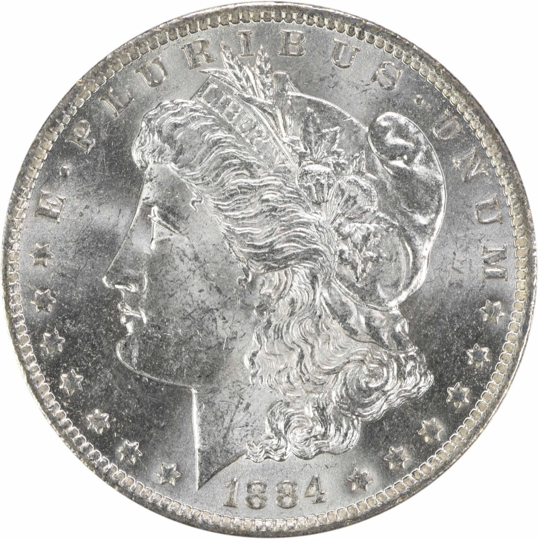 Uncirculated 1884 O Silver Dollar Morgan Type Brilliant Uncertified Example: Uncirculated 1884 O Silver Dollar Morgan Type Brilliant Uncertified Example This is an uncirculated 1884-O Morgan Silver Dollar from the United States. The coin features a Brilliant Uncirculated (BU) 