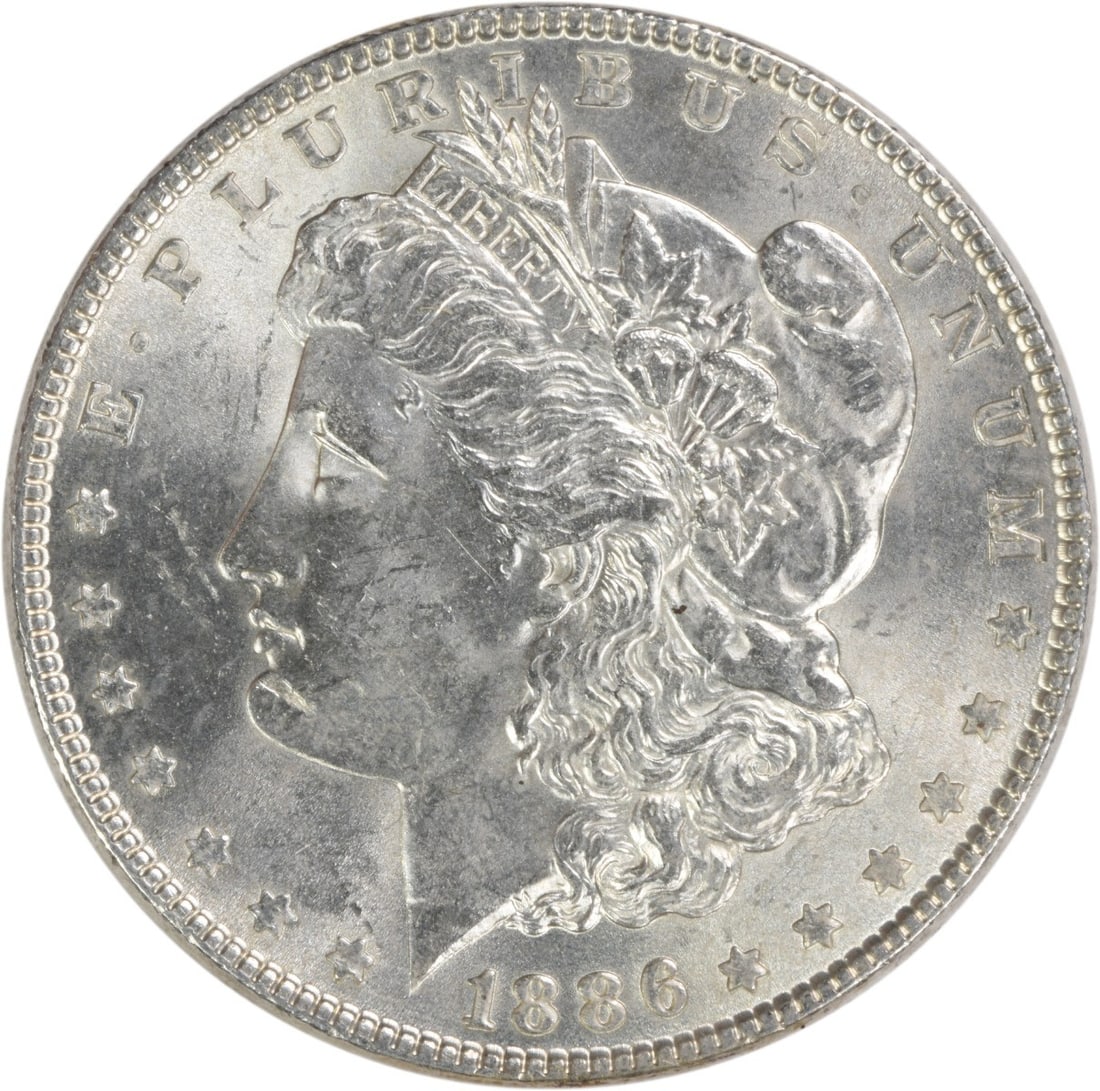Uncirculated 1886 Silver Morgan Dollar Philadelphia No Mint Mark BU: Uncirculated 1886 Silver Morgan Dollar Philadelphia No Mint Mark BU This 1886 Morgan Silver Dollar is an uncirculated, pre-owned coin composed of silver. It is a Brilliant Uncirculated (BU) example wi
