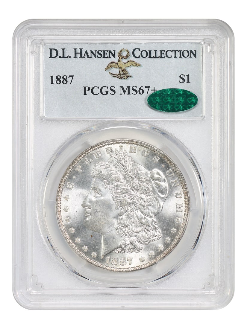 1887 Morgan Dollar $1 PCGS MS67+ CAC ex D.L. Hansen: 1887 Morgan Dollar $1 PCGS MS67+ CAC ex D.L. Hansen 1887 Morgan Dollar certified by PCGS and approved by CAC. This uncirculated example carries an MS67+ grade and is noted as ex: D.L. Hansen. A common
