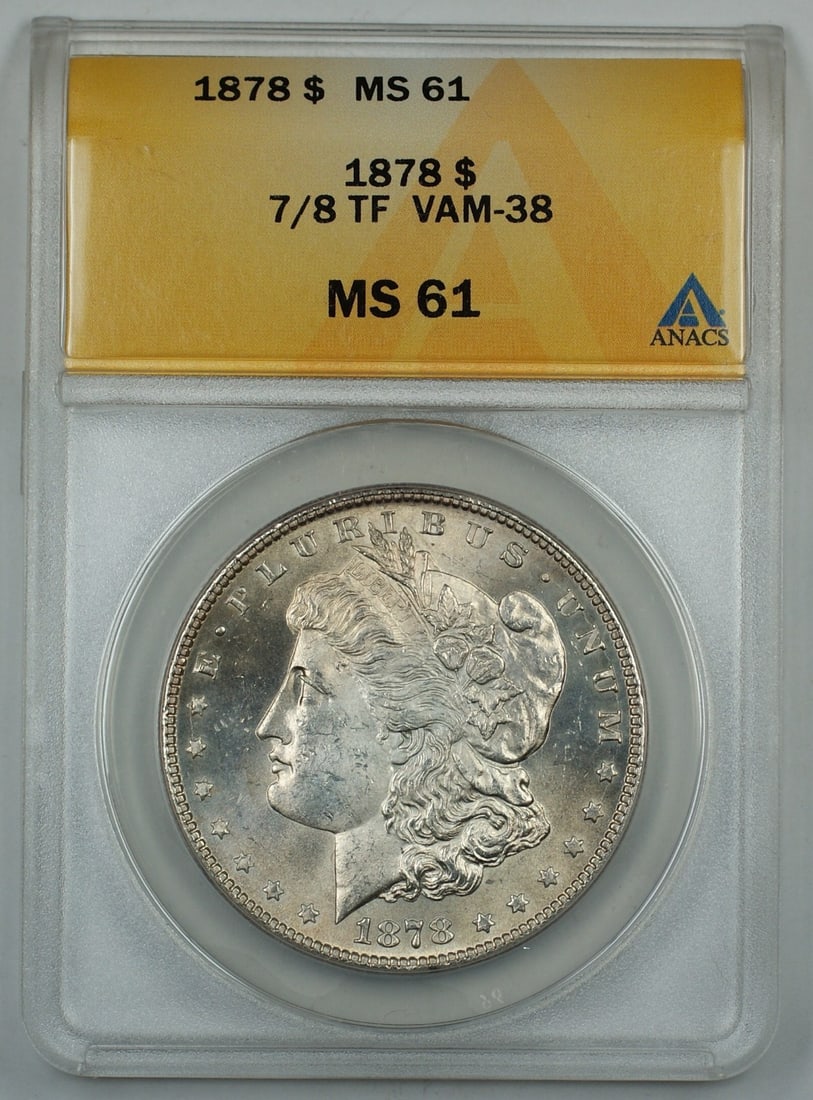 1878 Philadelphia Morgan Dollar VAM-38 7/8 TF ANACS MS 61 Silver Coin: 1878 Philadelphia Morgan Dollar VAM-38 7/8 TF ANACS MS 61 Silver Coin This is an 1878 Morgan Silver Dollar coin with the 7/8 Tail Feathers (TF) and VAM-38 designation. The coin is certified by ANACS w