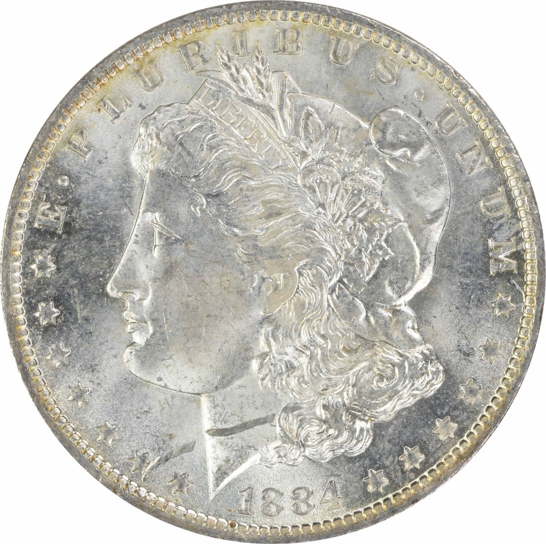 1884 O Morgan Silver Dollar $1 Uncirculated Uncertified: 1884 O Morgan Silver Dollar $1 Uncirculated Uncertified 1884-O Morgan Silver Dollar in uncirculated, pre-owned condition. This silver $1 coin is an uncertified Morgan dollar with a listed grade of MS6