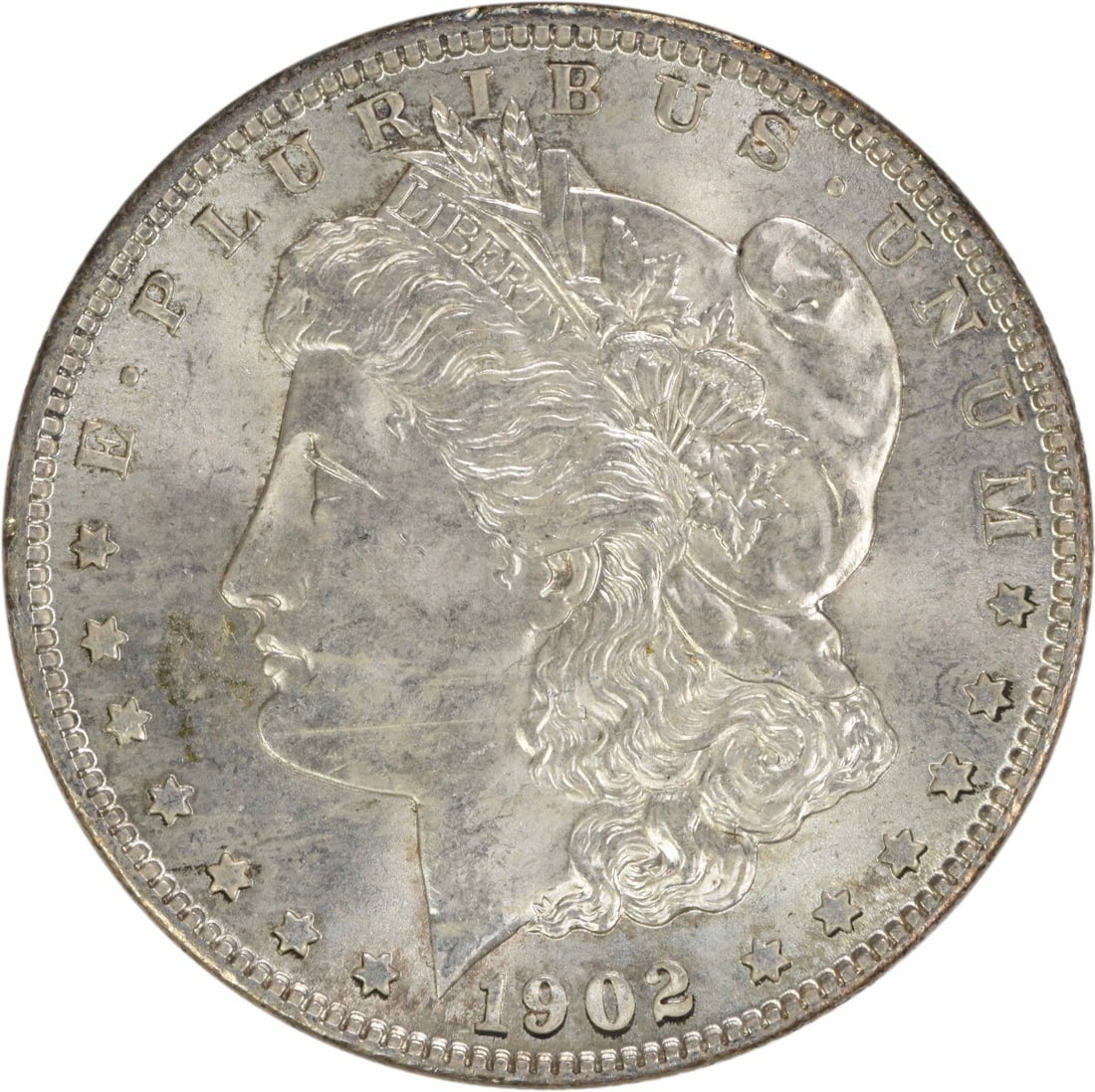 Choice BU 1902 O Silver Dollar Uncertified Morgan Coin: Choice BU 1902 O Silver Dollar Uncertified Morgan Coin This is a 1902-O Morgan Silver Dollar from the United States. The coin is composed of silver and features a denomination of $1. It was minted at 