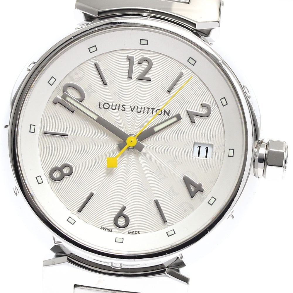 Louis Vuitton Tambour Hologram quartz ladies date watch Q13130: Louis Vuitton Tambour Hologram quartz ladies date watch Q13130 This is a pre-owned Louis Vuitton Tambour Hologram Date Quartz ladies wristwatch, model Q13130. The watch features a stainless steel case