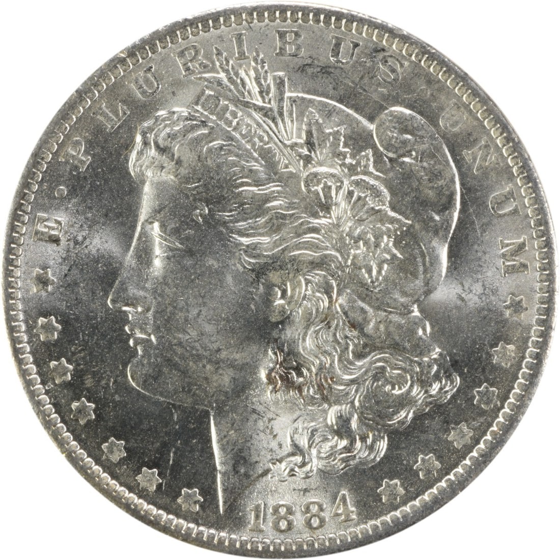 Choice BU 1884-O Silver Dollar Uncertified Morgan Coin: Choice BU 1884-O Silver Dollar Uncertified Morgan Coin This is an 1884-O Morgan Silver Dollar from the United States. The coin features a composition of silver and is graded as Choice Brilliant Uncirc