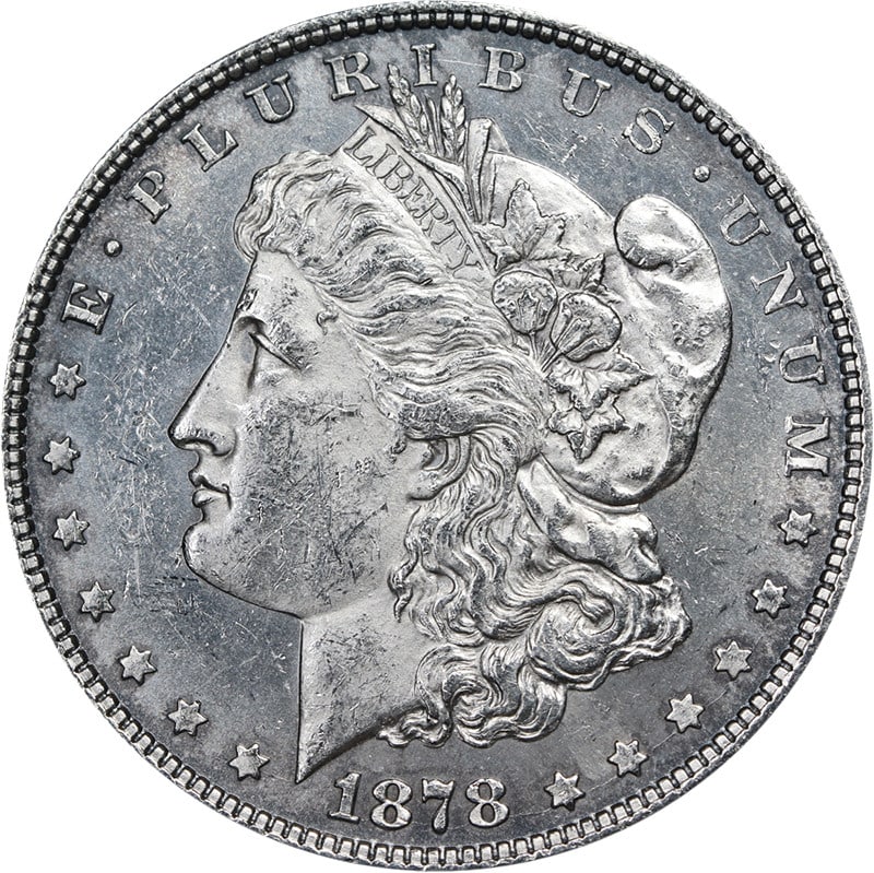 1878 P Morgan 8TF Silver Dollar Uncirculated: 1878 P Morgan 8TF Silver Dollar Uncirculated 1878-P 8TF Morgan Silver Dollar with nice uncirculated detail, decent eye appeal, nice luster, and a nice strike. This pre-owned coin is mostly white and u