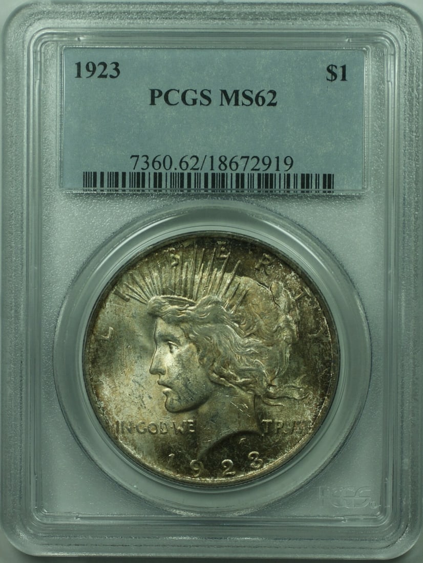 PCGS MS-62 Certified 1923 Peace Silver Dollar Toned Uncirculated Coin: PCGS MS-62 Certified 1923 Peace Silver Dollar Toned Uncirculated Coin This 1923 Peace Silver Dollar is certified by PCGS with a grade of MS-62. Struck in Philadelphia, the coin features a silver compo