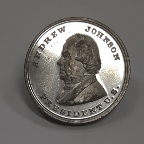 Evans and Watson Andrew Johnson Souvenir Token Medal with Hairlines: Evans and Watson Andrew Johnson Souvenir Token Medal with Hairlines This vintage trade token from the United States features a bust of President Andrew Johnson on one side and an advertisement for Dic
