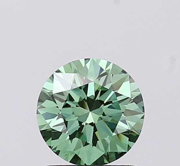 Ideal Loose Diamond - ROUND 1.0ct Fancy Vivid Green VS2: Ideal Loose Diamond - ROUND 1.0ct Fancy Vivid Green VS2 Source: This is a real non-mined Diamond that has been grown in a lab Shape: ROUND Carats: 1.0 Color: Fancy Vivid Green Certification: IGI Video