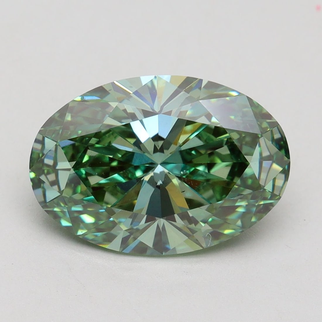 Loose Diamond - OVAL 4.02ct Fancy Vivid Green VS2: Loose Diamond - OVAL 4.02ct Fancy Vivid Green VS2 Source: This is a real non-mined Diamond that has been grown in a lab Shape: OVAL Carats: 4.02 Color: Fancy Vivid Green Certification: IGI Video:
