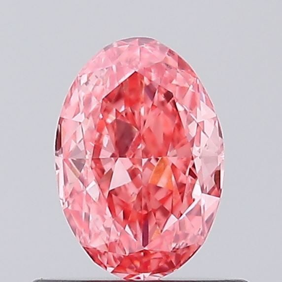 Loose Diamond - OVAL 0.5ct Fancy Vivid Pink VS1: Loose Diamond - OVAL 0.5ct Fancy Vivid Pink VS1 Source: This is a real non-mined Diamond that has been grown in a lab Shape: OVAL Carats: 0.5 Color: Fancy Vivid Pink Certification: IGI Video: