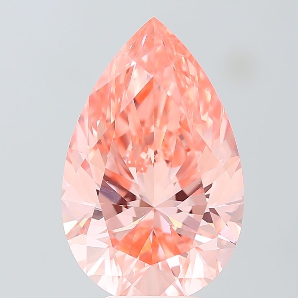 Loose Diamond - PEAR 7.03ct Fancy Vivid Orangey Pink VS1: Loose Diamond - PEAR 7.03ct Fancy Vivid Orangey Pink VS1 Source: This is a real non-mined Diamond that has been grown in a lab Shape: PEAR Carats: 7.03 Color: Fancy Vivid Orangey Pink Certification: I