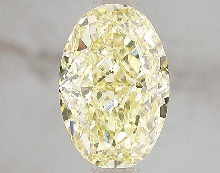 Loose Diamond - OVAL 2.02ct Fancy Vivid Yellow SI1: Loose Diamond - OVAL 2.02ct Fancy Vivid Yellow SI1 Source: This is a real non-mined Diamond that has been grown in a lab Shape: OVAL Carats: 2.02 Color: Fancy Vivid Yellow Certification: IGI Video: