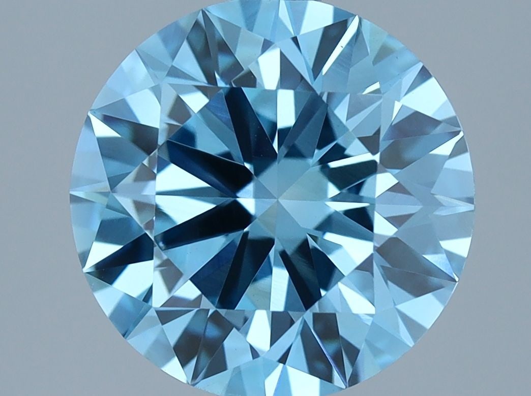 Loose Diamond - ROUND 2.4ct Fancy Vivid Blue VS1: Loose Diamond - ROUND 2.4ct Fancy Vivid Blue VS1 Source: This is a real non-mined Diamond that has been grown in a lab Shape: ROUND Carats: 2.4 Color: Fancy Vivid Blue Certification: IGI Video: Video