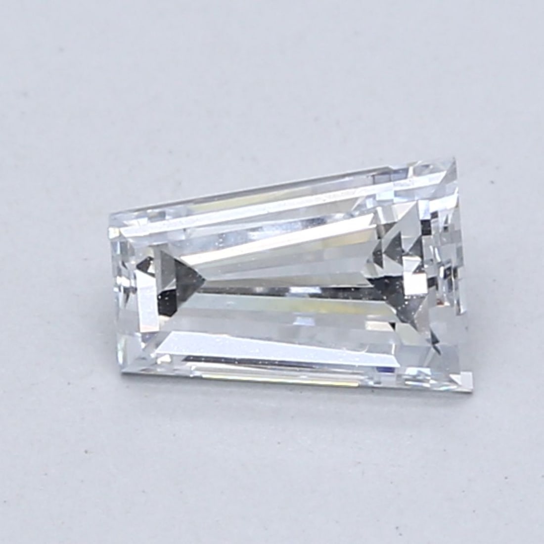 Loose Diamond - TAPERED BAGUETTE 0.8ct Fancy Light Blue VS1: Loose Diamond - TAPERED BAGUETTE 0.8ct Fancy Light Blue VS1 Source: This is a real non-mined Diamond that has been grown in a lab Shape: TAPERED BAGUETTE Carats: 0.8 Color: Fancy Light Blue Certificat