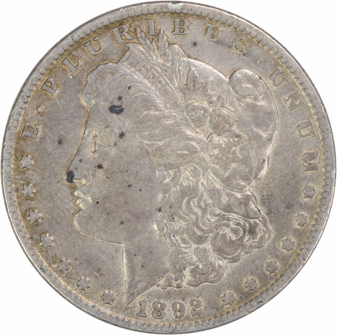 1892 New Orleans Morgan Dollar EF Grade Uncertified Silver Coin: 1892 New Orleans Morgan Dollar EF Grade Uncertified Silver Coin This is an 1892-O Morgan Silver Dollar from the United States, featuring a composition of 90% silver and 10% copper. Minted in New Orlea
