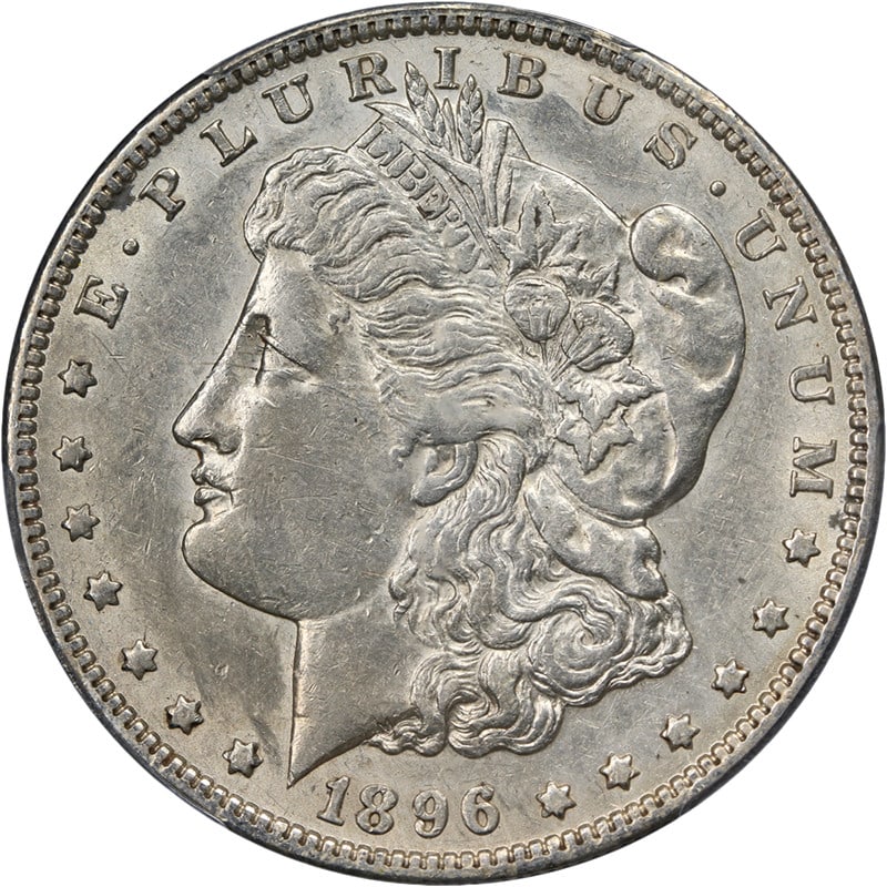 1896 O PCGS AU50 Morgan Silver Dollar: 1896 O PCGS AU50 Morgan Silver Dollar This 1896-O Morgan Silver Dollar is graded AU50 by PCGS and features attractive eye appeal and a well-defined strike. The coin presents original color and appeali