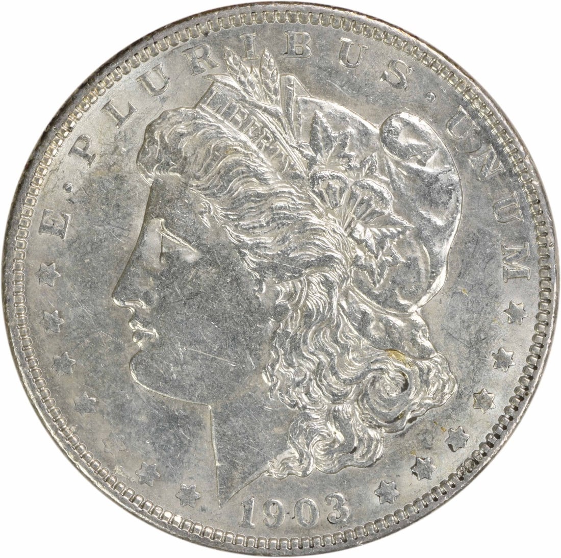 1903 Morgan Silver Dollar AU 90% Silver Uncertified Philadelphia Mint: 1903 Morgan Silver Dollar AU 90% Silver Uncertified Philadelphia Mint This 1903 Morgan Silver Dollar is a beautiful representation of American numismatic history, featuring a stunning design by George