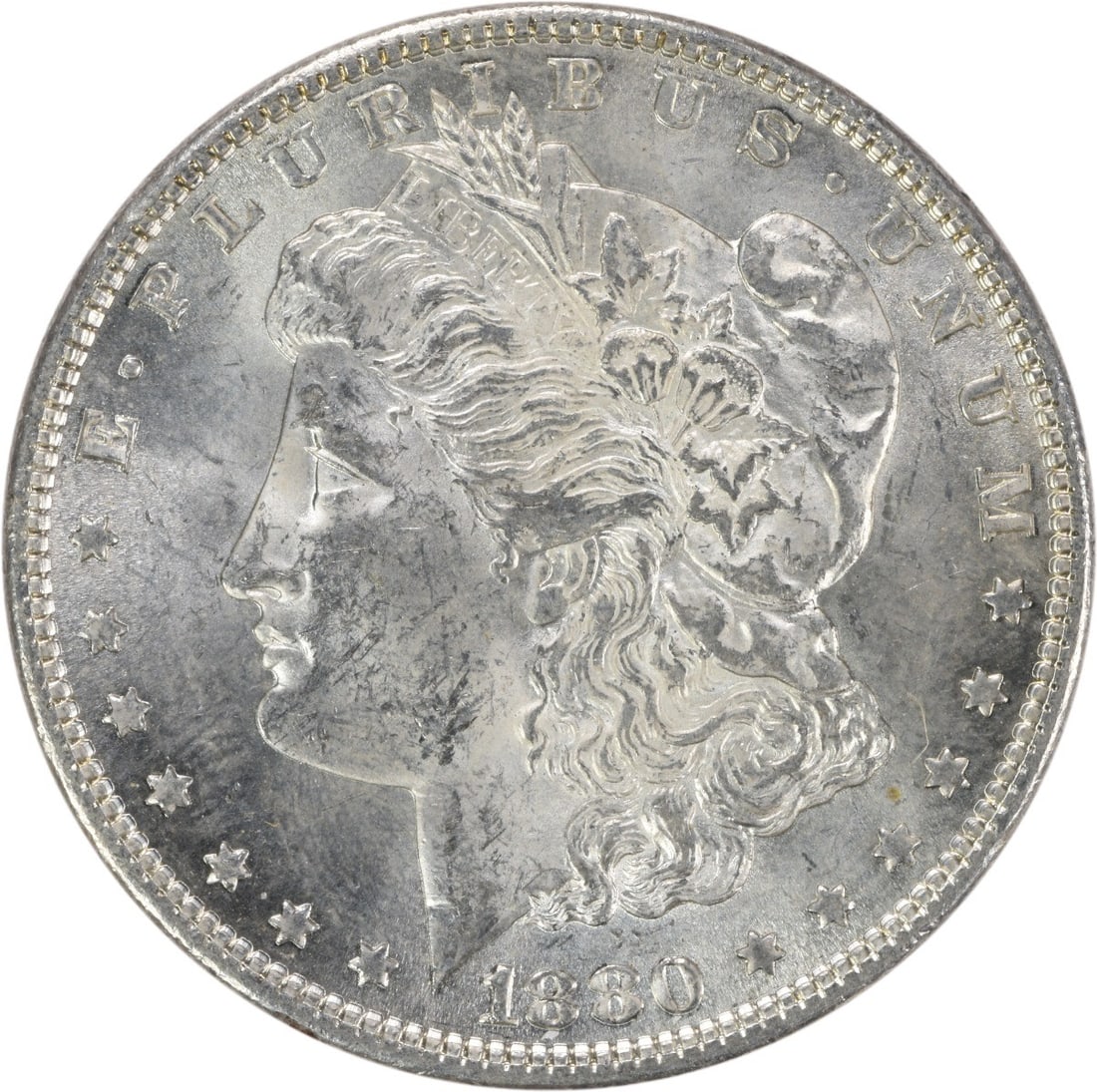 Uncirculated 1880 Morgan Silver Dollar Brilliant Uncertified No Mint Mark: Uncirculated 1880 Morgan Silver Dollar Brilliant Uncertified No Mint Mark This is an uncirculated 1880 Morgan Silver Dollar from the United States. The coin is composed of silver, has a denomination o