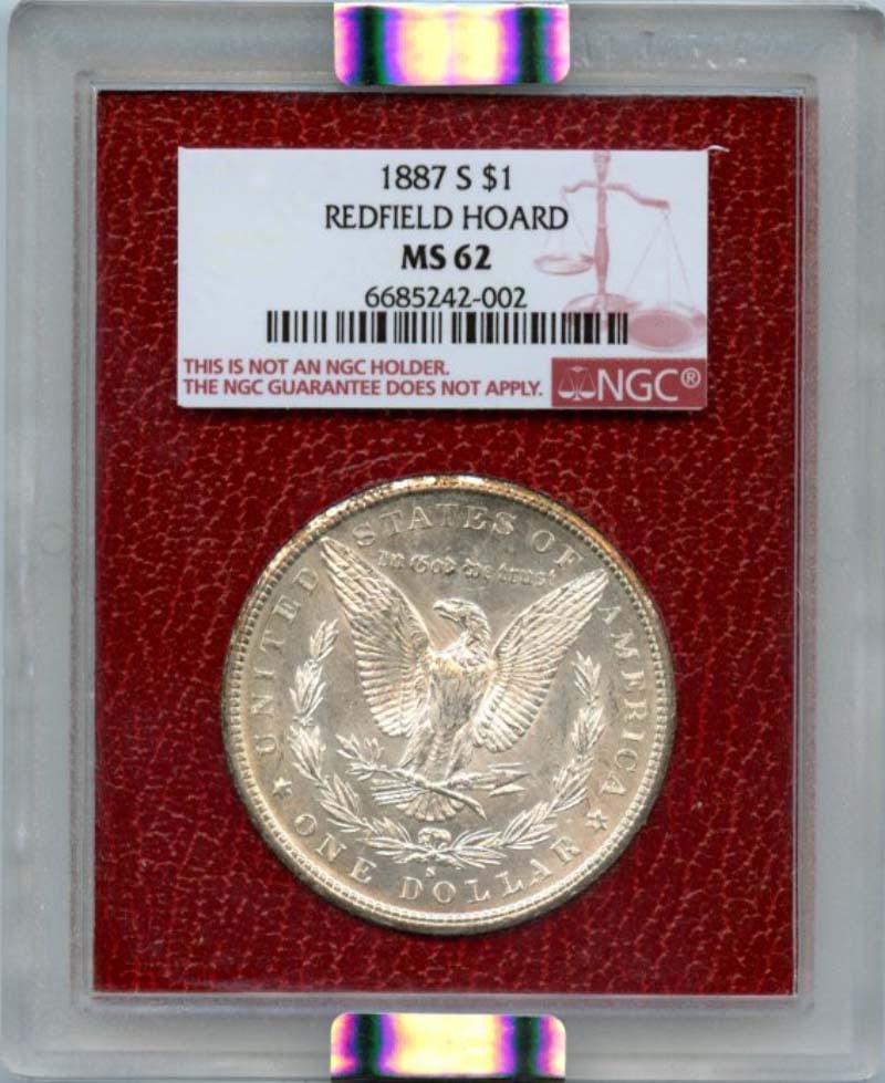 1887 S Morgan Silver Dollar NGC MS62 Redfield Hoard Uncirculated: 1887 S Morgan Silver Dollar NGC MS62 Redfield Hoard Uncirculated This 1887 S Morgan Silver Dollar from the Redfield Hoard is an exceptional piece, certified by NGC with a grade of MS62. It was minted 