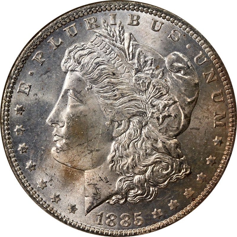 NGC MS64 1885-O Morgan Dollar with Toned Silver Finish: NGC MS64 1885-O Morgan Dollar with Toned Silver Finish This 1885-O Morgan Silver Dollar is certified by NGC with a grade of MS64. The coin features attractive toning and is composed of 90% silver. It 