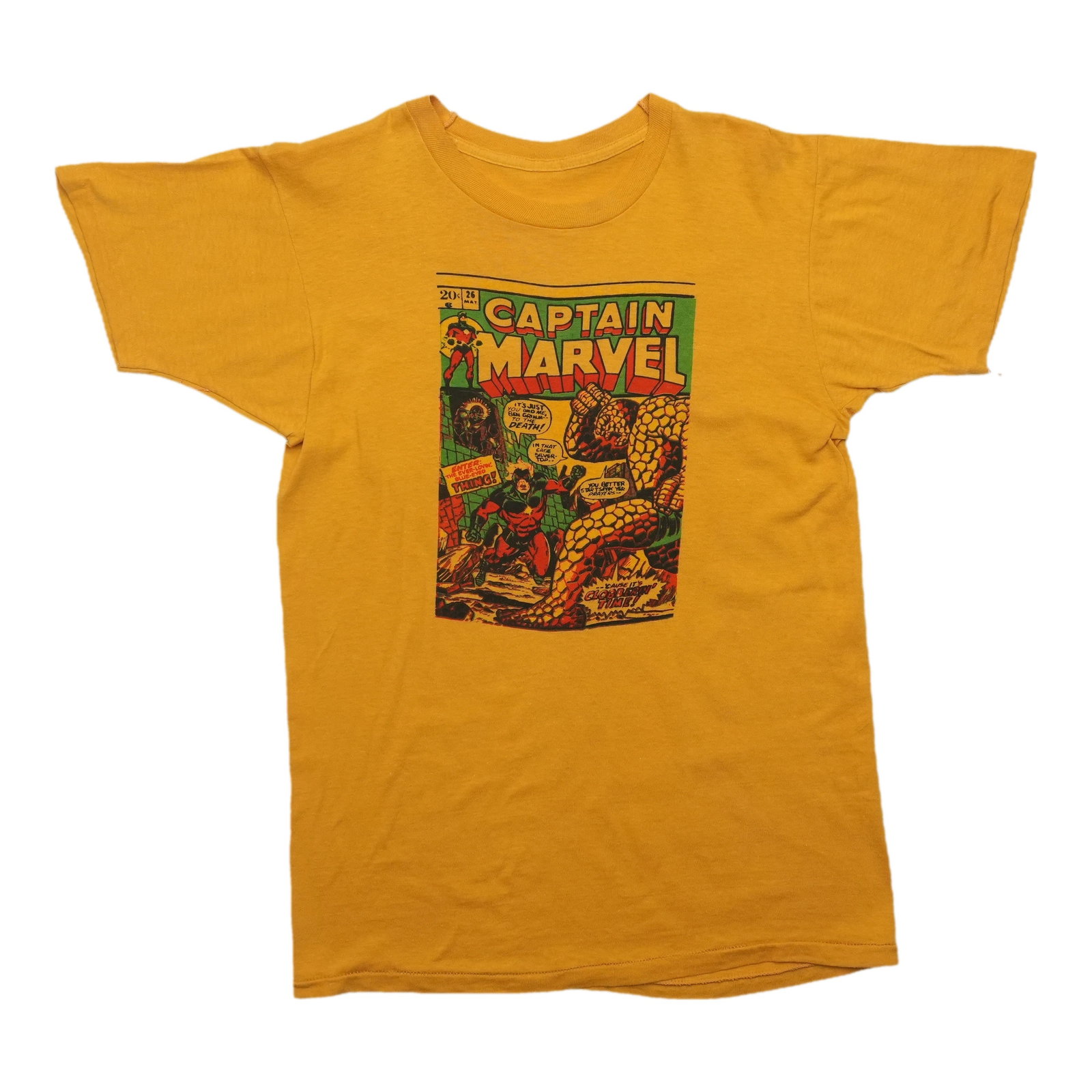Vintage 1970s Captain Marvel yellow cotton graphic tee: Vintage 1970s Captain Marvel yellow cotton graphic tee This is an original vintage Captain Marvel comic book shirt from the 1970s. Featuring a front graphic only, this shirt is made from 100% cotton a