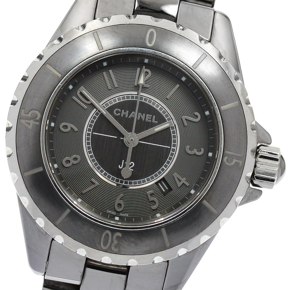 CHANEL J12 Chromatic H2978 Womens Quartz Date Wristwatch: CHANEL J12 Chromatic H2978 Womens Quartz Date Wristwatch Pre-owned CHANEL J12 Chromatic women's wristwatch with quartz movement and date function. This watch features a gray dial with a titanium and c