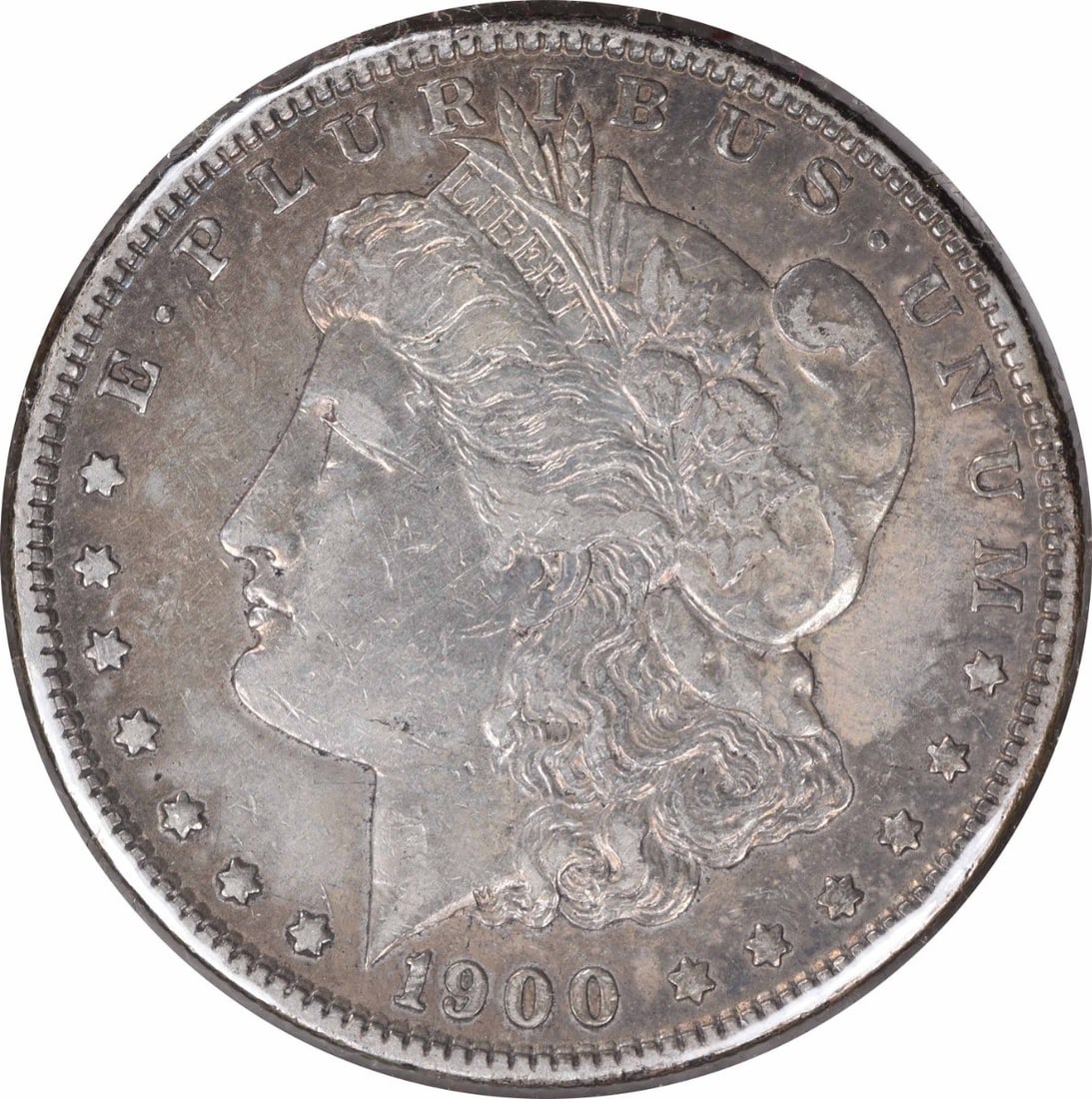 1900-O Morgan Silver Dollar Uncertified Coin by George T. Morgan: 1900-O Morgan Silver Dollar Uncertified Coin by George T. Morgan This 1900-O/CC Morgan Silver Dollar showcases the craftsmanship of renowned designer George T. Morgan. Struck in 90% silver and 10% cop
