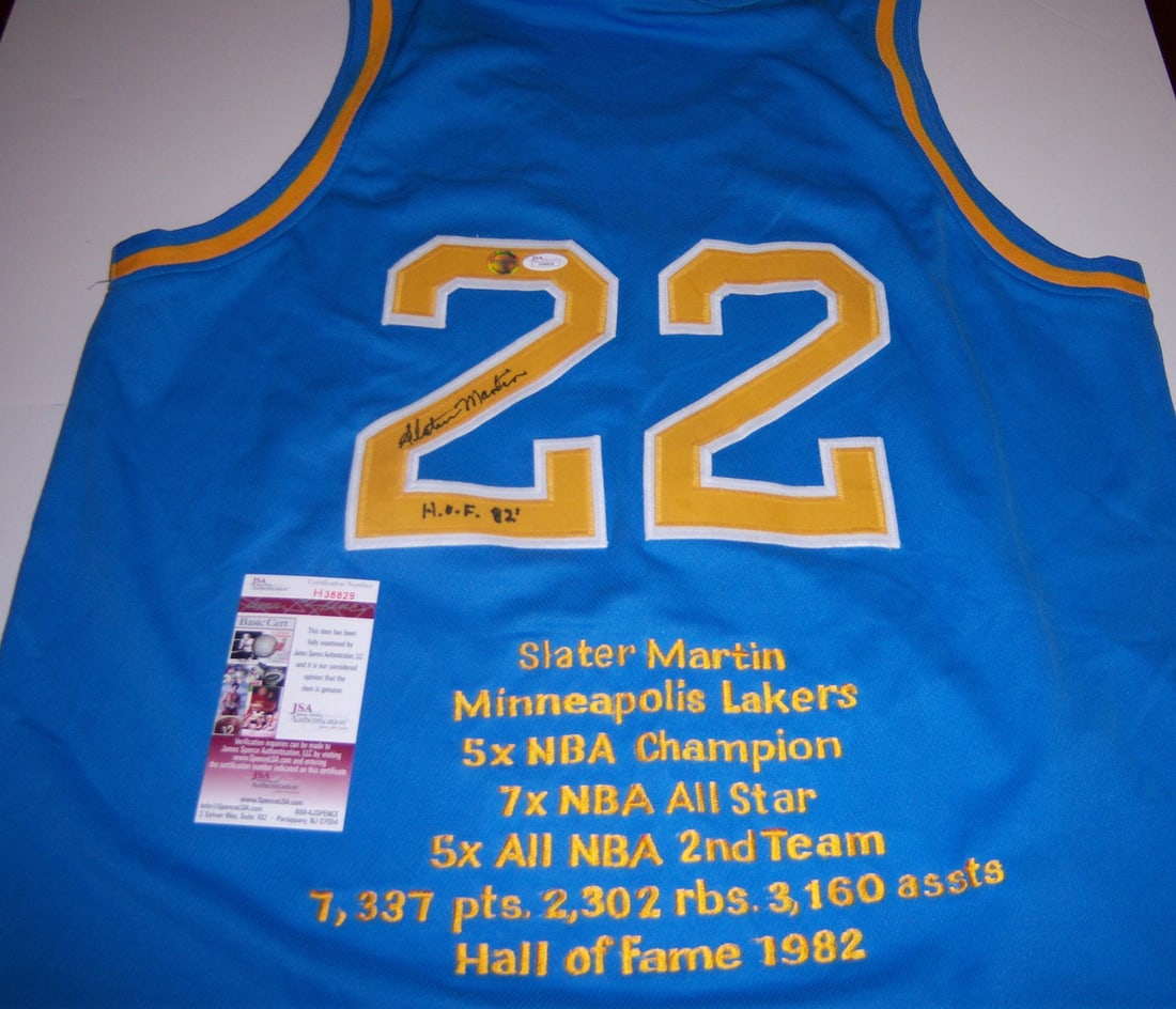 Slater Martin Signed Jersey Texas Longhorns JSA/COA Basketball Collectible: Slater Martin Signed Jersey Texas Longhorns JSA/COA Basketball Collectible This is a signed basketball jersey featuring Slater Martin, a notable player for the Minneapolis Lakers and Texas Longhorns. 
