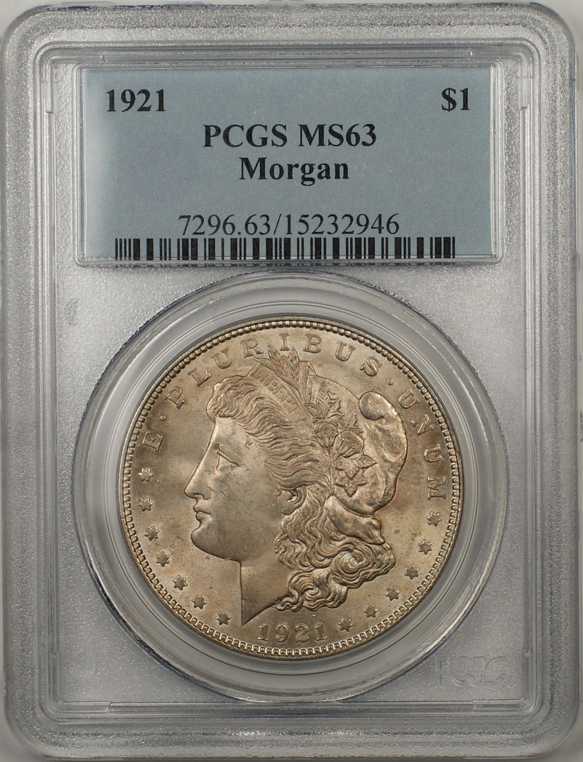 PCGS MS63 1921 Morgan Silver Dollar Light Toning: PCGS MS63 1921 Morgan Silver Dollar Light Toning This 1921 Morgan Silver Dollar features light toning and has been graded MS-63 by PCGS. Struck in Philadelphia, it is composed of silver and is uncircu