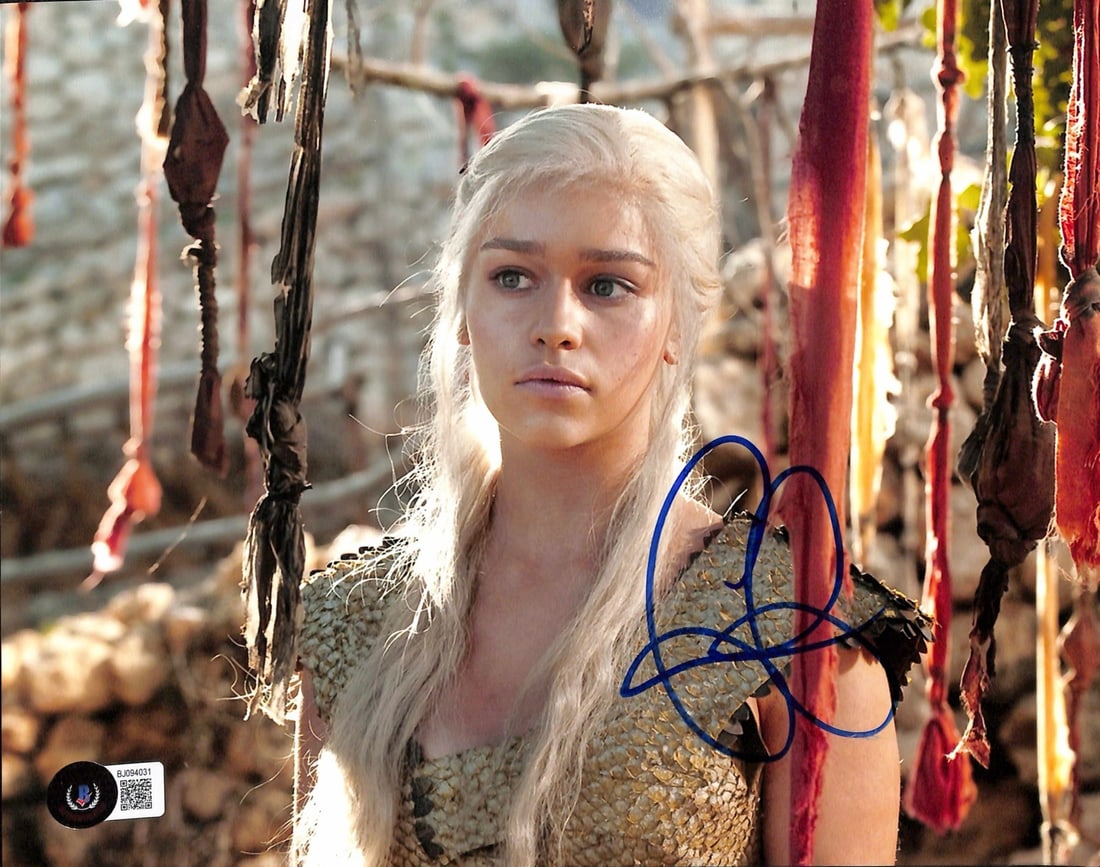 Emilia Clarke Signed 8x10 Game of Thrones Photo Beckett Certified: Emilia Clarke Signed 8x10 Game of Thrones Photo Beckett Certified This 8x10 photograph features an authentic autograph from Emilia Clarke, known for her iconic role as "Daenerys Targaryen" in the accl