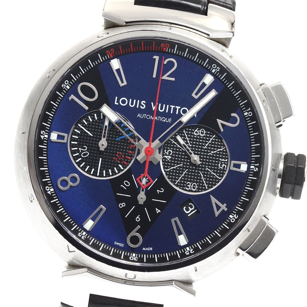 Louis Vuitton Tambour Q102V mens automatic chronograph wristwatch: Louis Vuitton Tambour Q102V mens automatic chronograph wristwatch Pre-owned Louis Vuitton Tambour chronograph wristwatch with automatic movement and a blue dial. This men's watch features date, chrono
