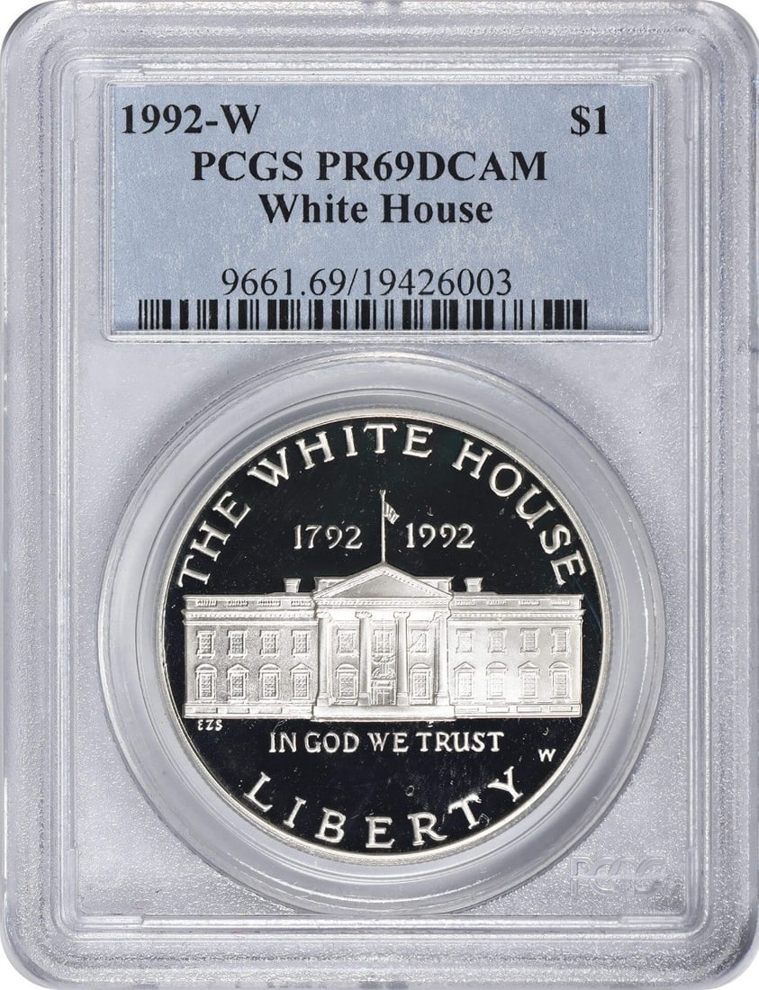 PCGS PR69DCAM 1992 W White House Silver Dollar Commemorative: PCGS PR69DCAM 1992 W White House Silver Dollar Commemorative This is a 1992-W White House Silver Commemorative Dollar, struck in proof quality and graded PR69 Deep Cameo by PCGS. The coin is composed 