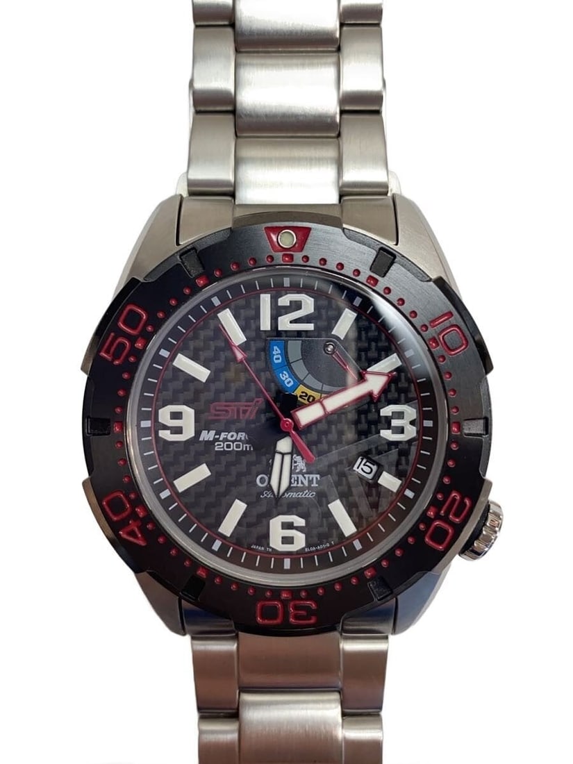 ORIENT STI M-FORCE Black Stainless Steel Men's Wristwatch: ORIENT STI M-FORCE Black Stainless Steel Men's Wristwatch This ORIENT x STI M-FORCE EL0A-D4-B men's wristwatch features a stainless steel case and band with a black dial. The watch is made in Japan an